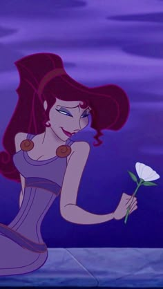 ariel from the little mermaid holding a flower