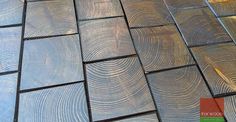 a close up view of wood planks that have been cut in half and placed on the ground