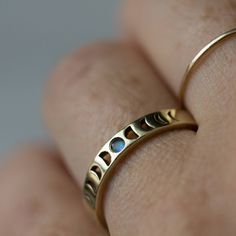 Bisclavret Moon phase Ring in Gold with Rainbow Moonstone, Moon phase wedding band, Phases of the moon, Moonstone engagement ring, gift ideas, 12th HOUSE JEWELRY, moon phase collection, ceremonial and celestial, 12th house astrology, ethically sourced gemstones, celestial jewelry, alternative bridal, indie wedding, boho style wedding Moon Phase Ring, Glamour Uk, Wolf Moon, Moon Lovers, Gold Moon, Jewelry Photography, Moon Phases, Moon Stone, White Ring