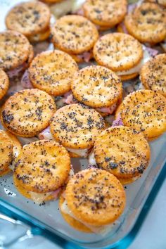 there are many small pastries in the dish on the table and ready to be eaten