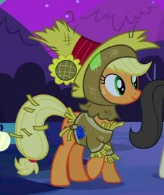 the pony is wearing a costume and standing next to another pony