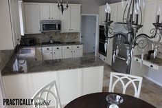 the kitchen is clean and ready to be used for cooking or dining room furniture, as well as new appliances