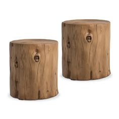 two wooden stools sitting next to each other