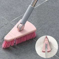 a pink and gray brush on the ground with a white plate underneath it that says flexible brush head