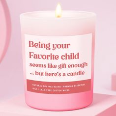 a pink candle that says, being your favorite child seems like gift enough but here's a candle