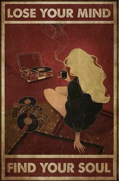 a woman sitting on top of a table next to a record player