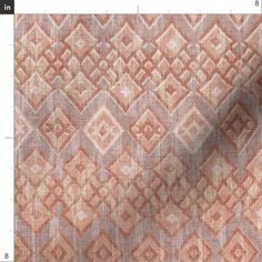 an orange and white pattern on fabric, with the measurements for each piece in it