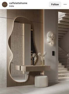 the interior of a modern bathroom is shown with stairs and vases on the counter