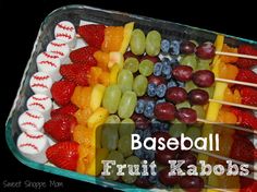 a baseball themed fruit kabobs in a plastic container