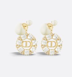 The Dior Tribales earrings are offered in a timeless and elegant variation. The hallmark resin pearls reveal a rear gold-finish metal CD signature encircled by silver-tone faceted crystals. The earrings may be worn with other creations from the Petit CD line.. Jeweled Earrings, Faceted Crystal, Gold Finish, Metallica, Gold Earrings, Silver Tone, Cd, Dior, Crystals