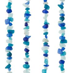 three strands of blue and white sea glass beads on a white background with space for text