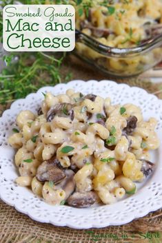 macaroni and cheese with mushrooms in a white bowl