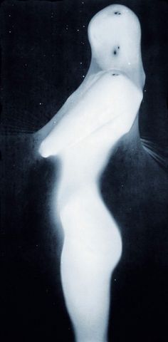 an abstract photograph of a woman's body in white