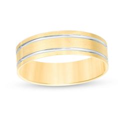 a wedding ring with two bands in yellow gold and silver