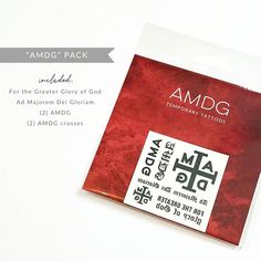 an amdg temporary tattoo pack with red ink