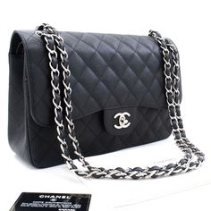 Brand: Chanel Model: Double flap Color: Black Material: Leather Inclusions: Authenticity card, Dust bag, Box, Care booklet Dimensions: W 30 H 20 D 9.1 cm Serial number: 18303006 Country of origin: Italie Condition: AB - good condition. This genuine Chanel Large Grained Calfskin Double Flap Chain Shoulder Bag boasts an elegant black hue and is impeccably crafted from grained calfskin, often referred to as Caviar Leather, signifying its contemporary style likely originating from the year 2013. The Chanel Double Flap, Chanel Model, Chain Shoulder Bag, Quilted Leather, Chain Strap, Chanel Bag, Gucci Bag, Backpack Bags, Louis Vuitton Bag