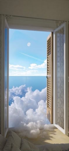 an open window looking out onto the clouds and ocean from a bed in a room