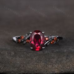 Vintage oval ruby engagement ring Black gold ring Art deco leaf design garnet wedding ring nature inspired ring bridal promise ring gift.  Unique oval shaped ring, wedding ring, promise ring, anniversary gift. Main Stone: 6x8mm coffin oval ruby Side stone: Garnet *I accept custom making order.Please contact me if you need this service. This ring is marked S925/G10K/G14K I accept custom making order.Please contact me if you need this service. For all the jewelries,there is a 14 days money back gu Unique Ruby Ring, Black Gold Ruby Ring, Oval Ruby Engagement Ring, Unique Ruby Rings, Red Engagement Ring, Ruby Engagement Ring Vintage, Ruby Engagement Ring Set, Garnet Wedding Rings, Engagement Ring Black