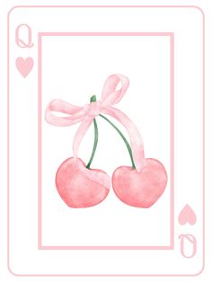 a card with two cherries tied to it's sides in pink and white