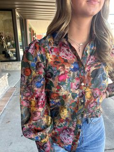 This Silvia Floral Blouse is the perfect addition to your wardrobe. With a lady like floral design, this top is versatile for both work and play. The high-quality material and expert craftsmanship make it a great choice for any occasion. A must-have for any fashion-forward individual looking to elevate their style. Silk Blouse With Floral Print, Silk Floral Print Blouse For Daywear, Silk Button-up Shirt With Floral Print, Elegant Floral Print Shirt For Fall, Elegant Fall Shirt With Floral Print, Multicolor Silk Blouse For Work, Blouson Sleeves Button-up Blouse, Spring Multicolor Office Shirt, Silk Button-up Top With Floral Print