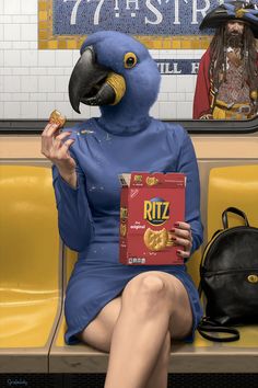 a woman sitting on a bench with a box of chips in her hand and a blue parrot head