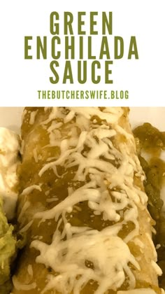 green enchilada sauce is drizzled over the top of a burrito