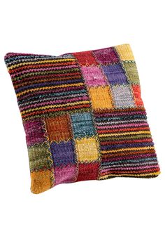 a multicolored pillow on a white background