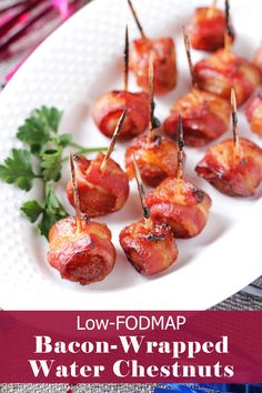 bacon wrapped water chestnuts on a white plate with parsley garnish and text low fodmap bacon wrapped water chestnuts