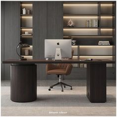 an office desk with a laptop on it and shelves in the back ground, behind which is a bookcase full of books