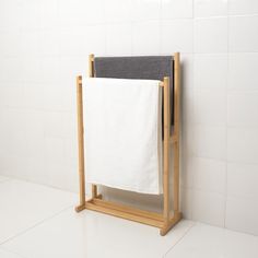 a towel rack with two towels hanging on it