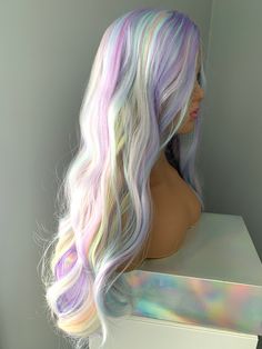 Transform your look in an instant with the magical "Dolly" wig! With its mesmerizing 28 inch, long wavy neon rainbow synthetic hair, you'll be channeling all the mythical mermaid and unicorn vibes with its blue, pink, teal and purple highlights. Turn heads and stand out from the crowd! Mermaid Wig, Mermaid And Unicorn, Rainbow Wig, Purple Highlights, Pink Mermaid, Neon Rainbow, The Fringe, Hair Combs, Synthetic Wig