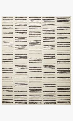 a rug with black and white stripes on it