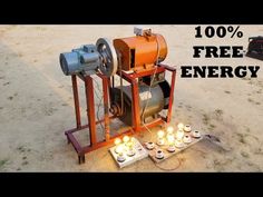 an image of a machine that is on the ground with candles in front of it