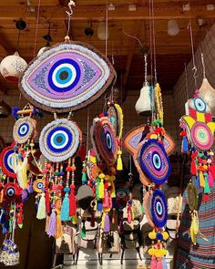 many colorful items are hanging from the ceiling