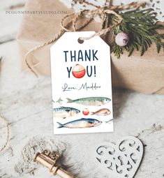 a thank you tag with fish on it