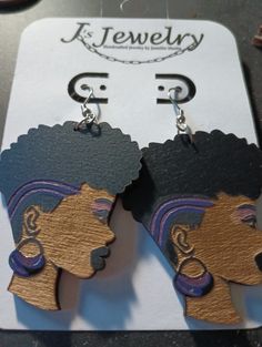 1.75 inch wood earrings of a woman with a short haircut and two colored lines and earring.  Stainless steel ear wire. Wood Earrings, Ear Wire, Short Hair Cuts, Jewelry Earrings Dangle, Dangle Drop Earrings, Dangle Earrings, Hair Cuts, Jewelry Earrings, Drop Earrings