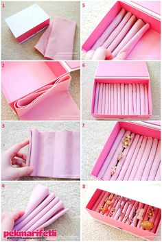 how to make an origami jewelry box with pink paper and gold beads on the inside