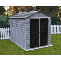 an outdoor storage shed with the doors open