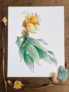 a watercolor painting of a woman in a green dress sitting on top of a piece of paper