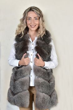 Made using 100% authentic fur, sourced from certified European fur auctions Made in Greece by AskioFashion Shell or outer:Real Frost Fox in Natural Colour Inner Fabric:Satin Lining Measurements from size:38eu/inus-8 Length:30.8-31.4 inches  bust-36.2 inches Length:78-80cm     bust-89cm Model is Wearing a size: Height-1,80cmBust-85cmWaist-65cmHips-95cm Mede to measure in every size, we accept customization For sizes XXL and XXXL, price of the coat is 10% and 20% higher Luxury Winter Fur Coat With Feather Trim, Luxury Fur Coat With Feather Trim For Winter, Luxury Fluffy Winter Fur Coat, Luxury Fluffy Fur Coat For Winter, Fox Brand, Fox Fur Vest, Iced Chai, New Birthday, Women Vest