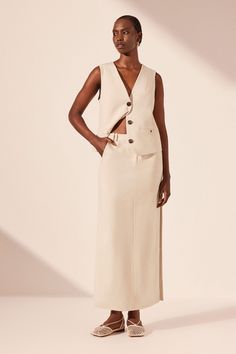 Elegant Beige Asymmetrical Maxi Skirt, Chic Wide Leg Maxi Skirt With Side Slits, Chic Maxi Skirt With Side Slits For Spring, Chic Maxi Skirt With Side Slits, Elegant Maxi Skirt With Side Slits, Beige Maxi Dress With Side Slits, Spring Maxi Skirt With Split Design, Chic Beige Maxi Dress With Side Slits, Chic Fitted Maxi Skirt With Split Hem