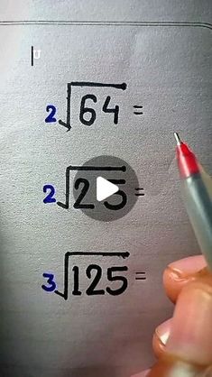 a person holding a pen and writing on a piece of paper with numbers in it