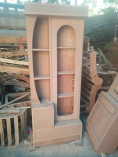 an old china cabinet in the process of being painted