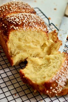 a loaf of bread sitting on top of a cooling rack