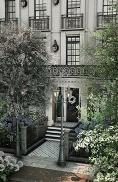 an artistic rendering of a building with trees and flowers on the front porch, in black and white