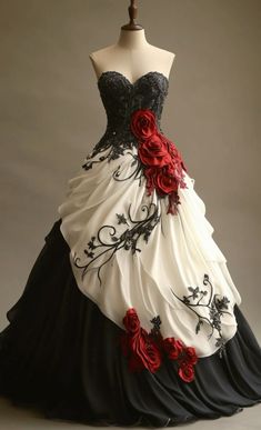 a black and white dress with red flowers on the bouncy skirt is displayed