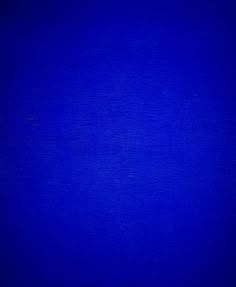 an image of a blue background that looks like it has been painted