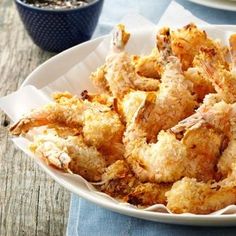 some fried food is on a white plate