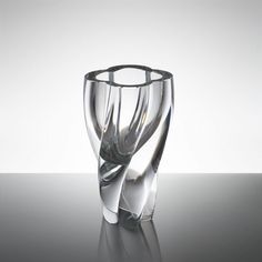 a clear glass sitting on top of a table