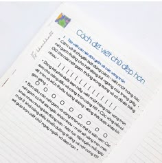 a close up of a notebook with writing on it